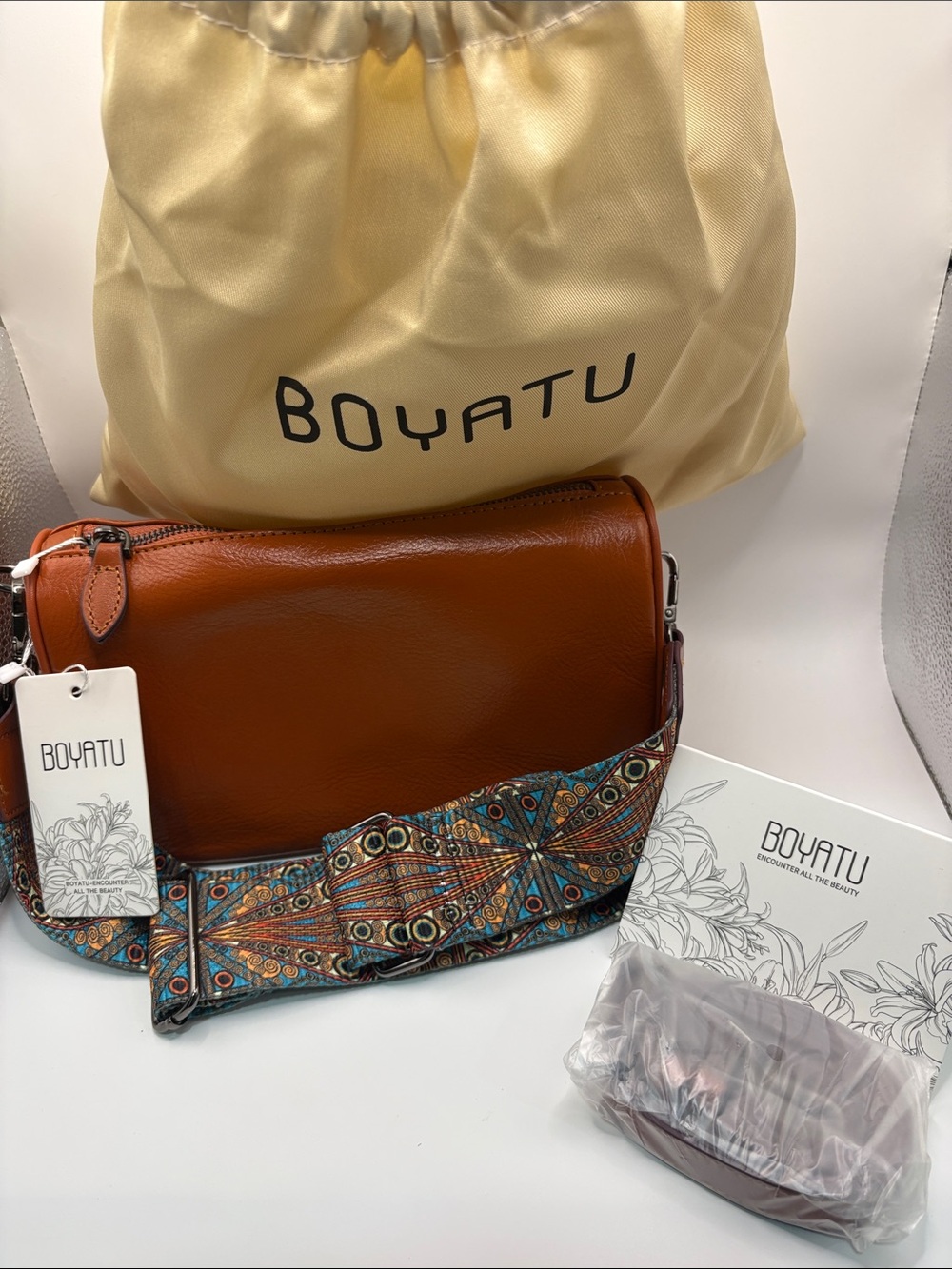 Women's Tan Leather Crossbody Bag with Colorful Patterned Strap